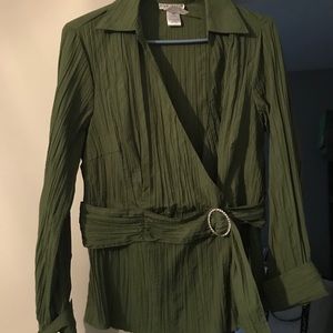 Blouse with rhinestone embellishment at waist.